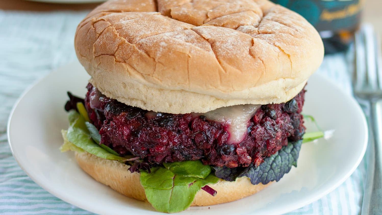  Loaded with fresh produce and served on a soft bun, this burger is almost too beautiful to eat.