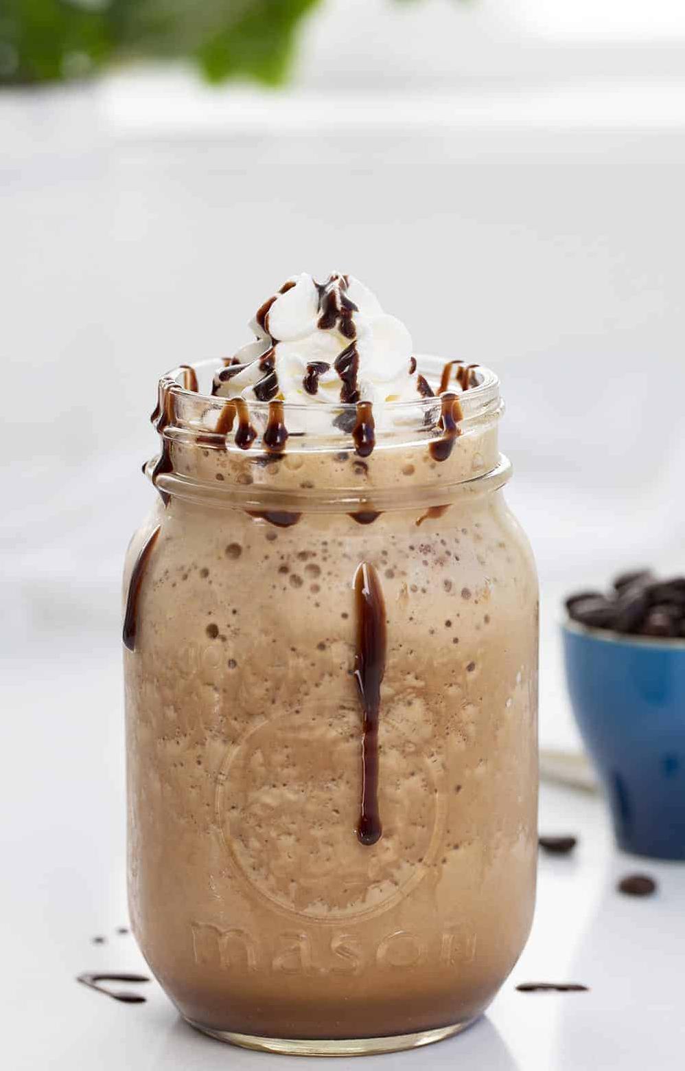  Take a break from your day and indulge in a mocha frappuccino with whipped cream.