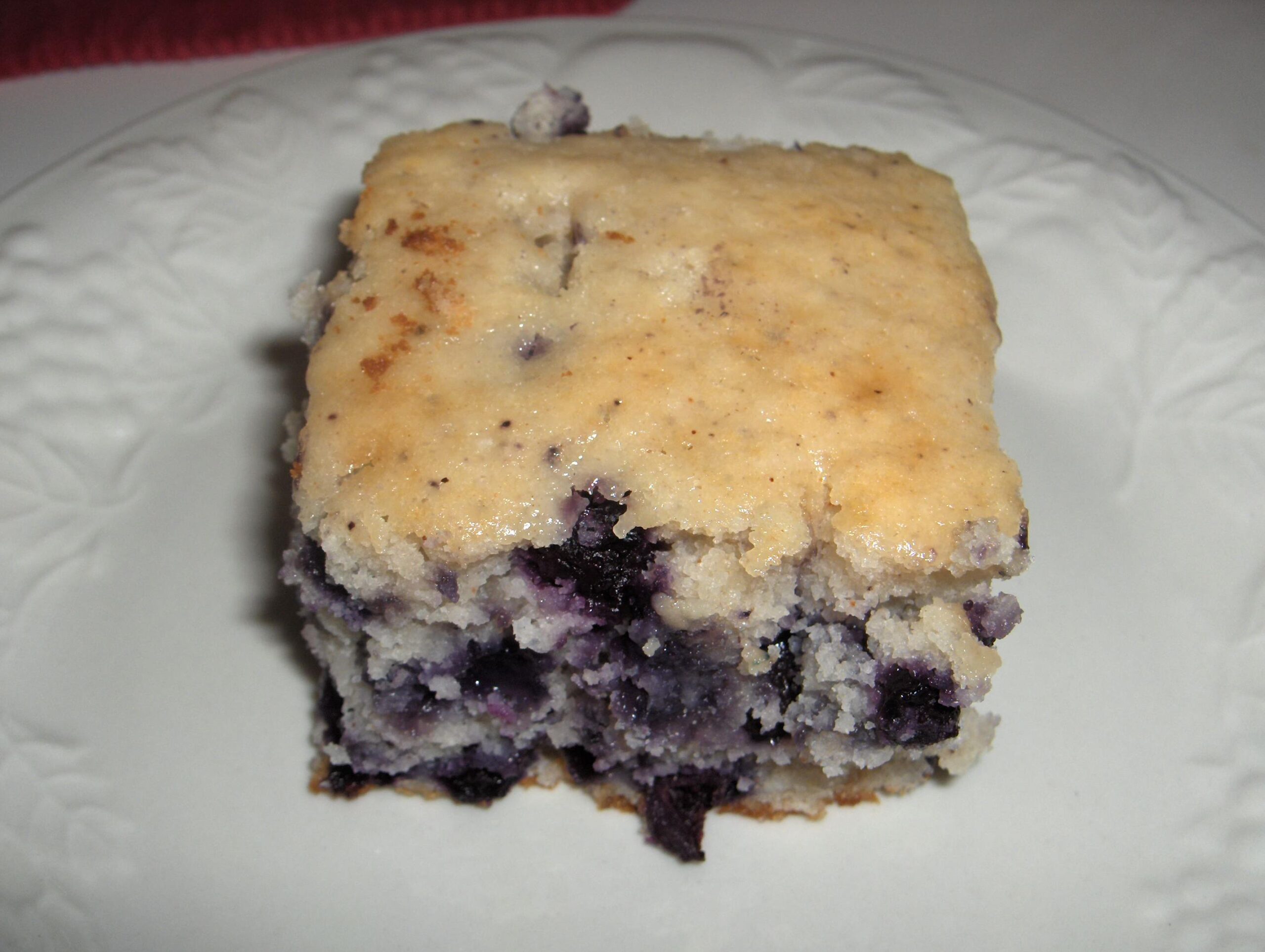  Your coffee break just got sweeter with this blueberry-sour cream delight.